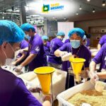 FedEx volunteers pack 10,000 fortified meals for Cebu schoolchildren